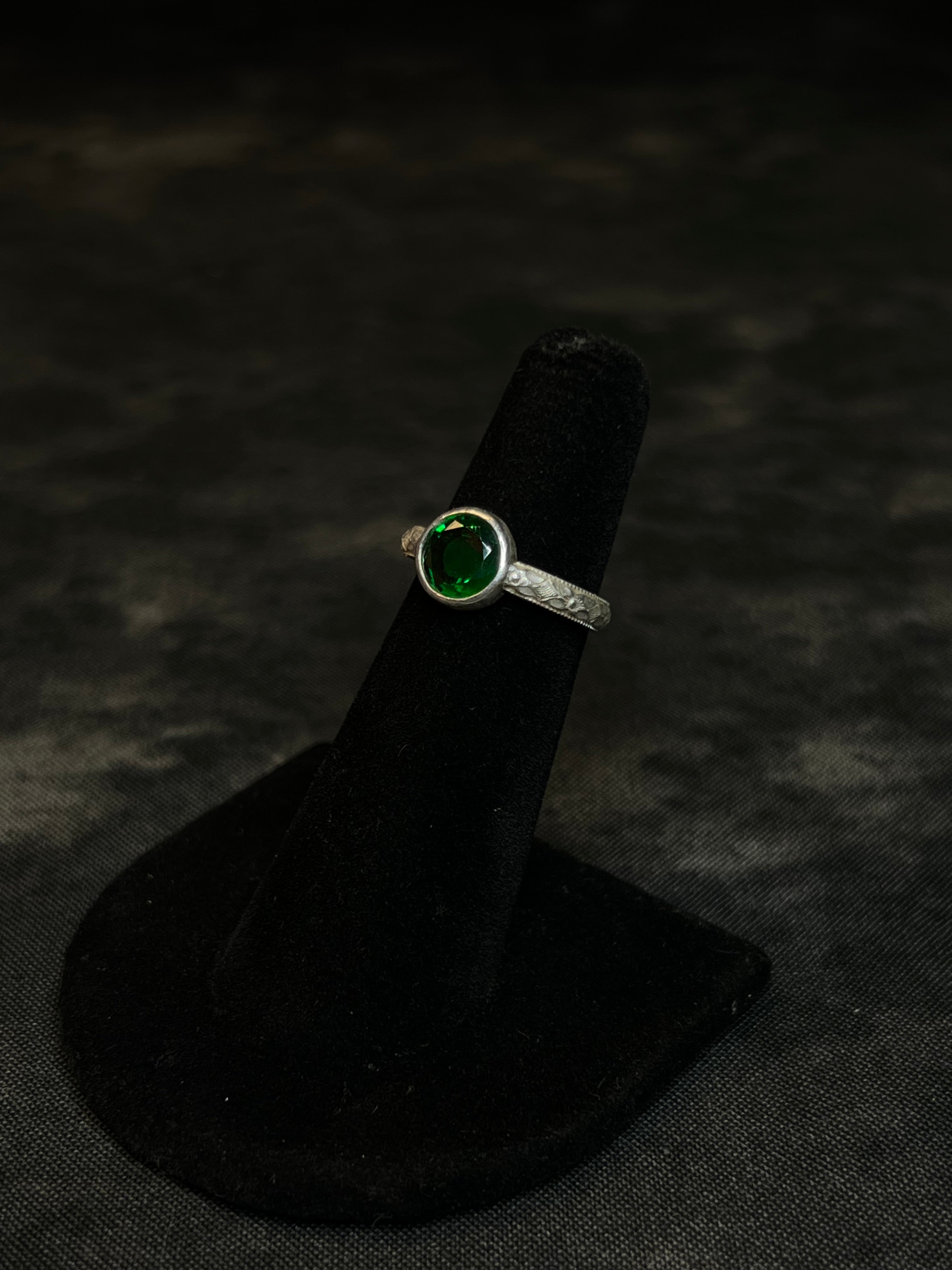 BEZEL SET EMERALD CZ