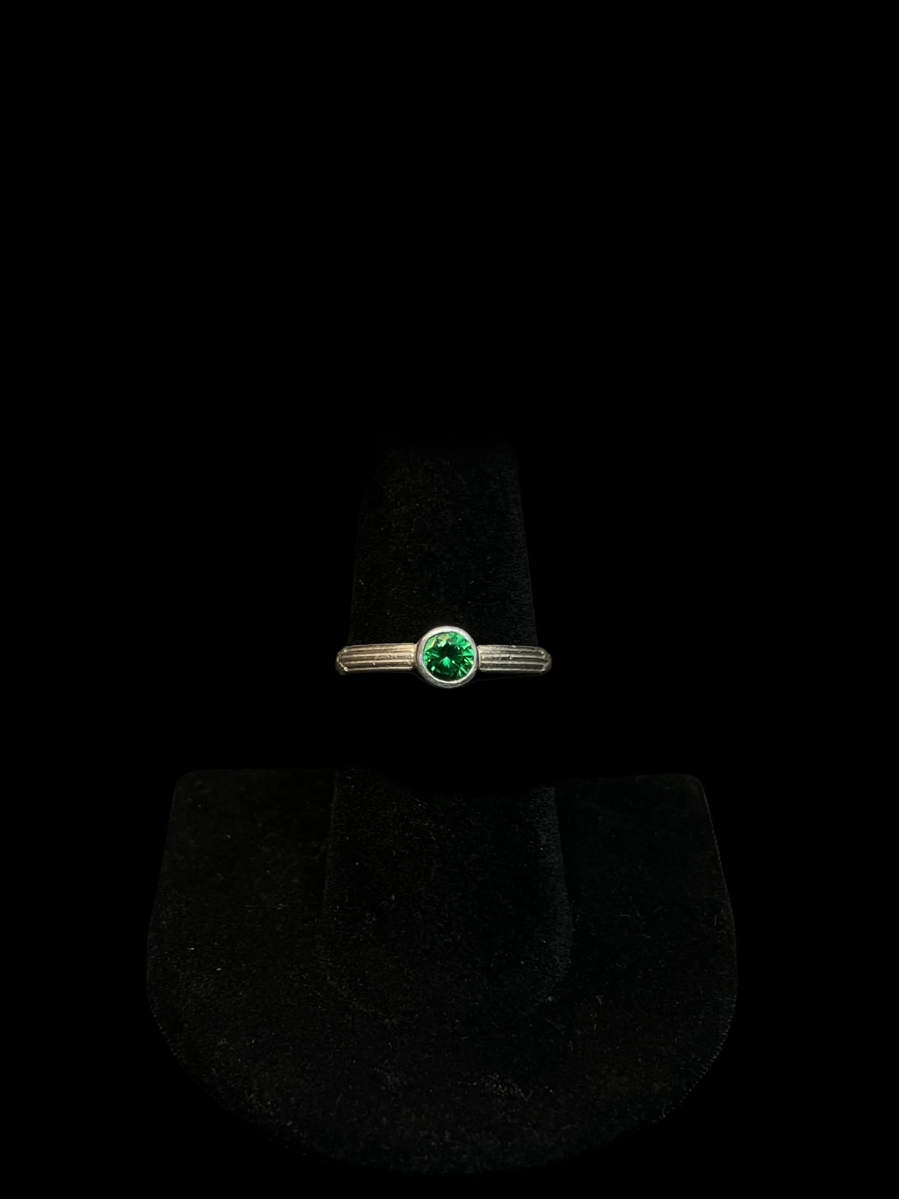 BEZEL SET EMERALD CZ