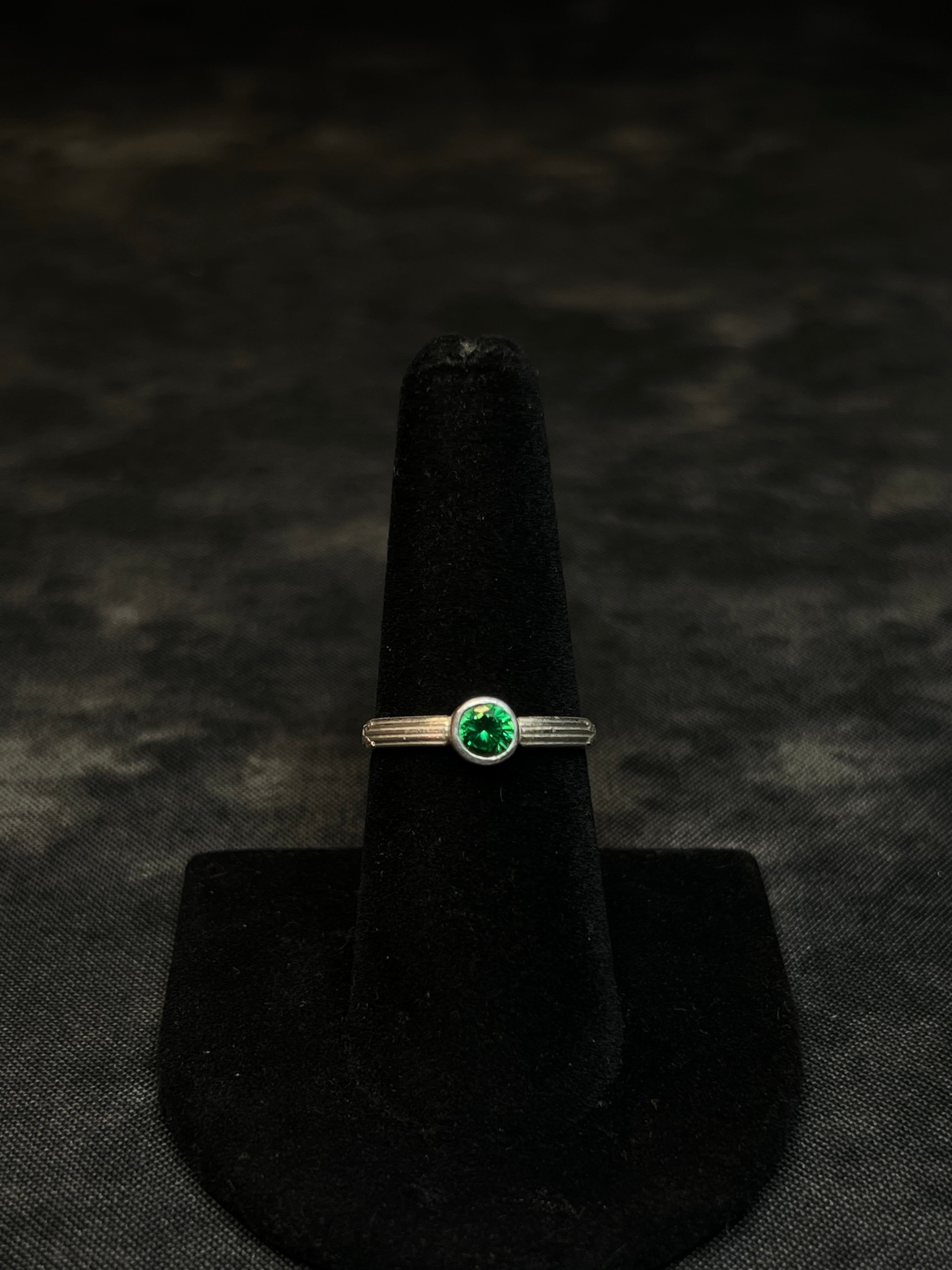 BEZEL SET EMERALD CZ