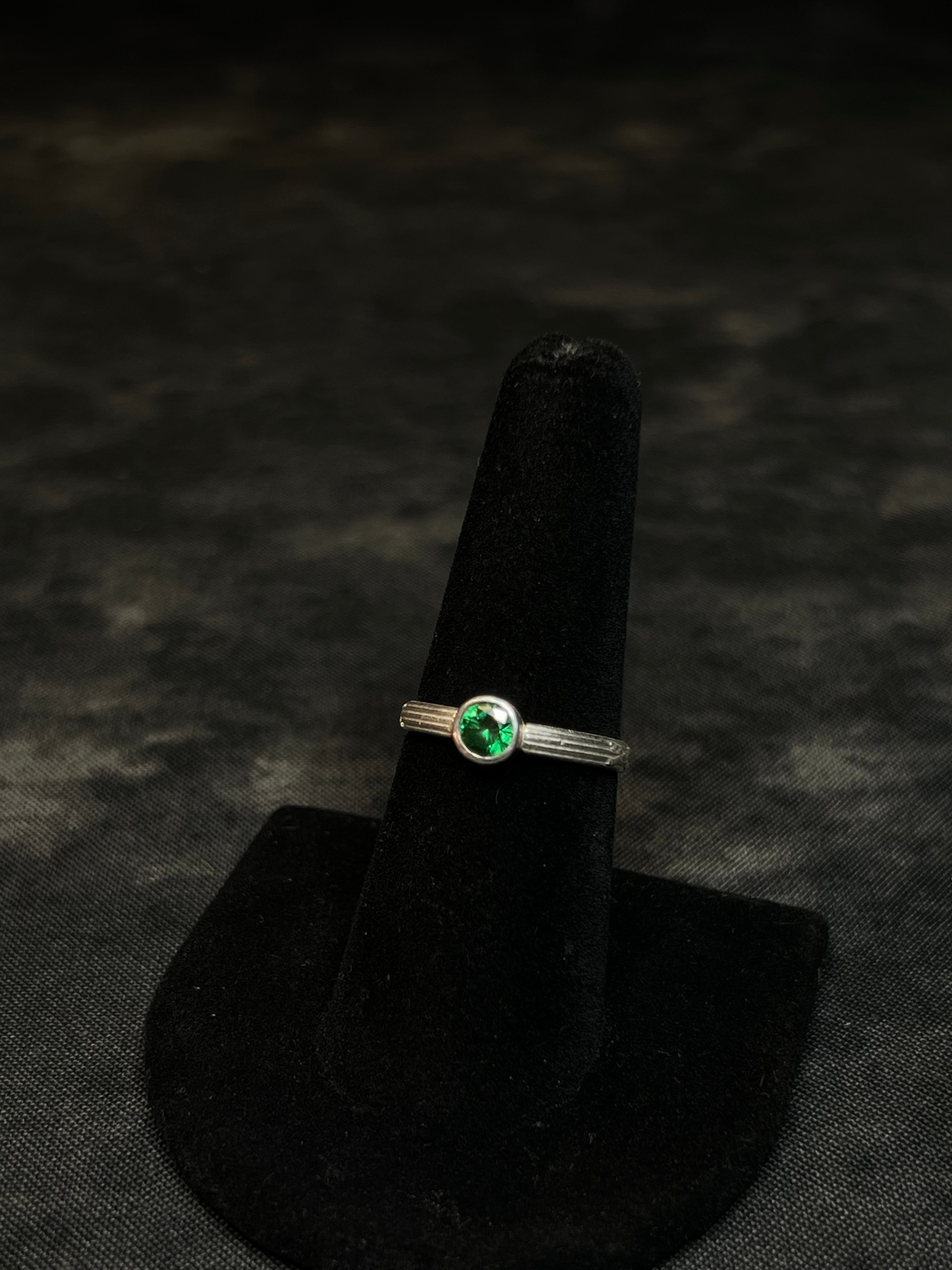 BEZEL SET EMERALD CZ